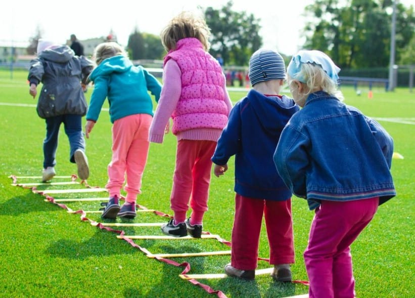 kids playing on artificial turf